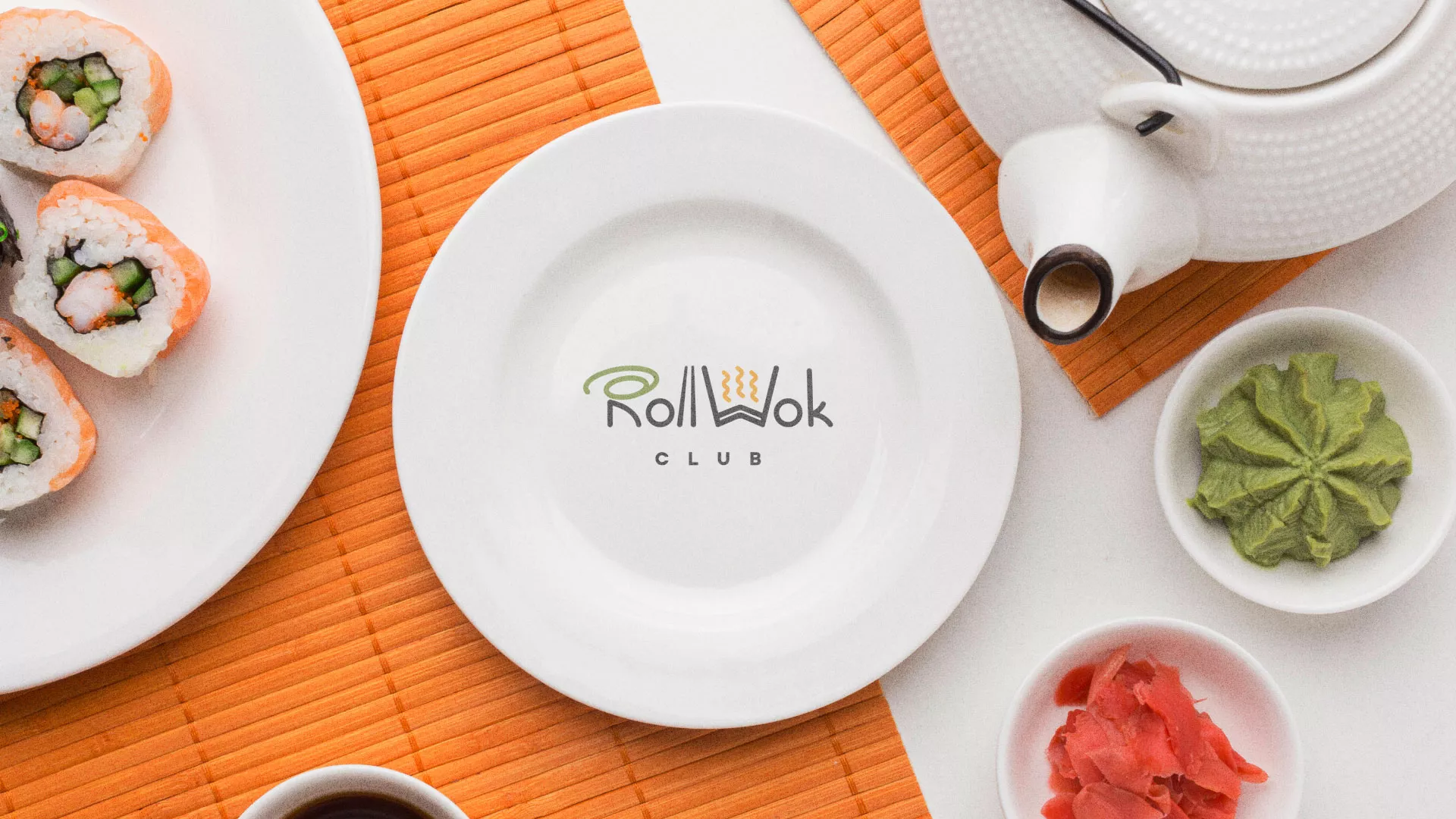 Разработка логотипа и фирменного стиля в Шенкурске для суши-бара «Roll Wok Club»